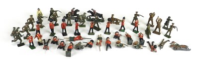 Lot 247 - A collection of post-WWI 'lead' soldiers, some stamped Britains