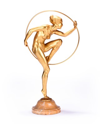 Lot 404 - L* Alliot, an Art Deco style standing female nude hoop dancer