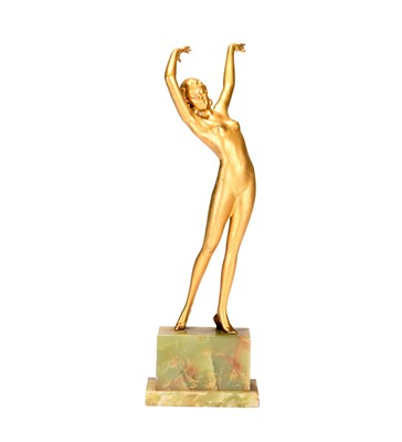 Lot 222 - In the manner of Josef Lorenzl, an Art Deco figurine of a dancing nude lady