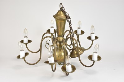 Lot 478 - A Continental brass eight-light chandelier,...