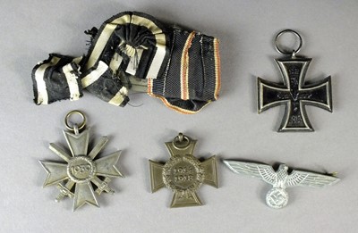 Lot 228 - A collection of WW2 German Third Reich medals, badges and awards