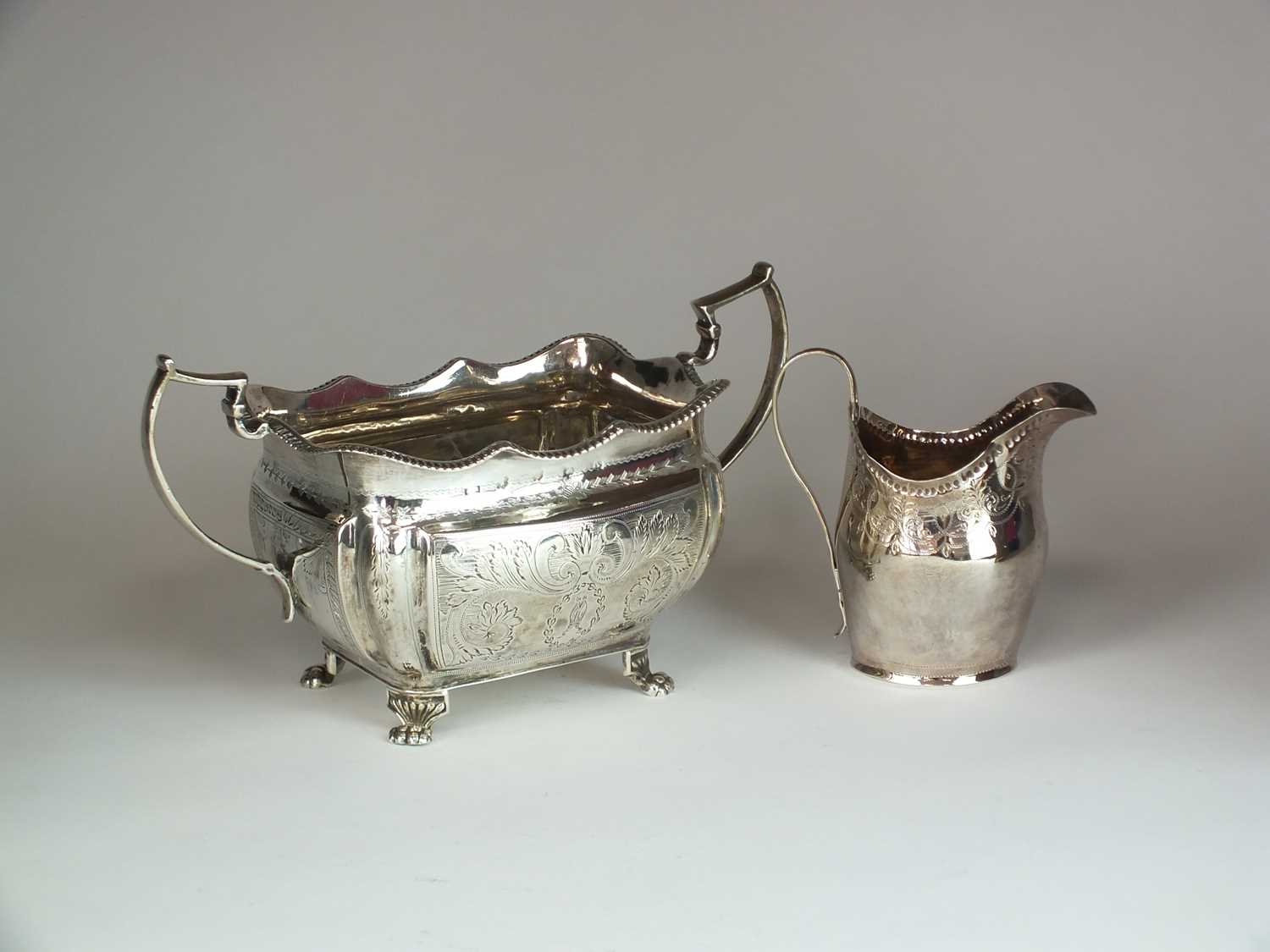 Lot 22 - A silver sugar bowl and cream jug