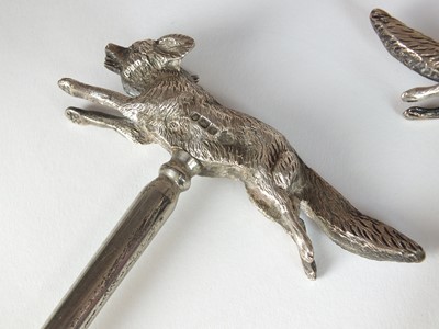 Lot 5 - A pair of silver fox handled  boot pulls