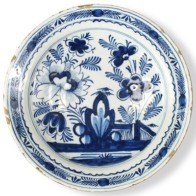 Lot 233 - An 18th-century European tin-glaze earthenware charger