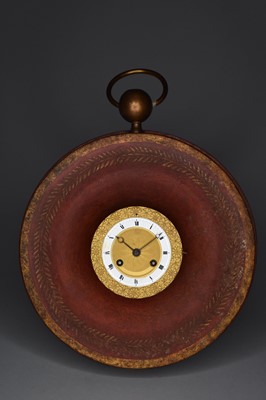 Lot 421 - A late 19th century French, tole circular wall clock