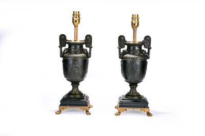 Lot 395 - A pair of late 19th century, Regency style,  bronze urns, converted to lamps