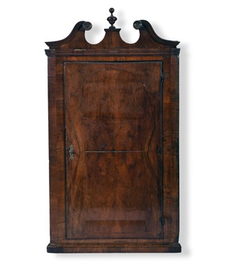 Lot 308 - A George II walnut veneered hanging corner cupboard