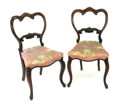 Lot 617 - A set of 6 Victorian rosewood balloon back type dining chairs