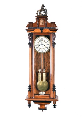 Lot 418 - A large walnut and mahogany Vienna type wall clock