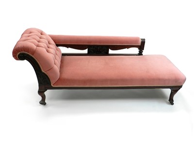 Lot 384 - A late Victorian carved mahogany chaise longue, with another (2)
