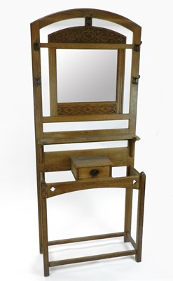 Lot 285 - An Edwardian pale oak hall stand