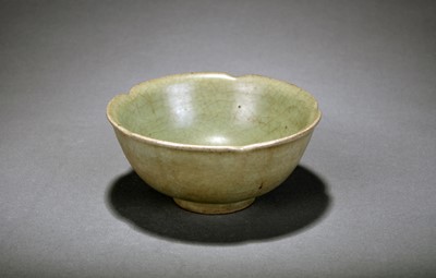 Lot 288 - A Chinese Longquan celadon lotus bowl, Ming Dynasty