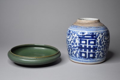 Lot 311 - A Chinese Jun type brush washer and a blue and white jar