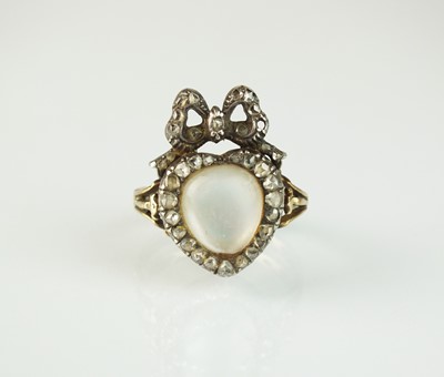 Lot 45 - A 19th century moonstone and rose cut diamond heart and bow ring