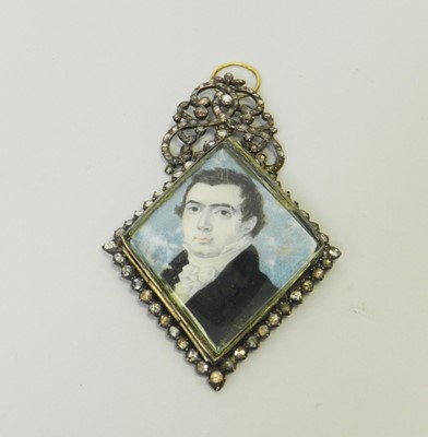 Lot 24 - An early 19th century rose cut diamond set miniature portrait pendant