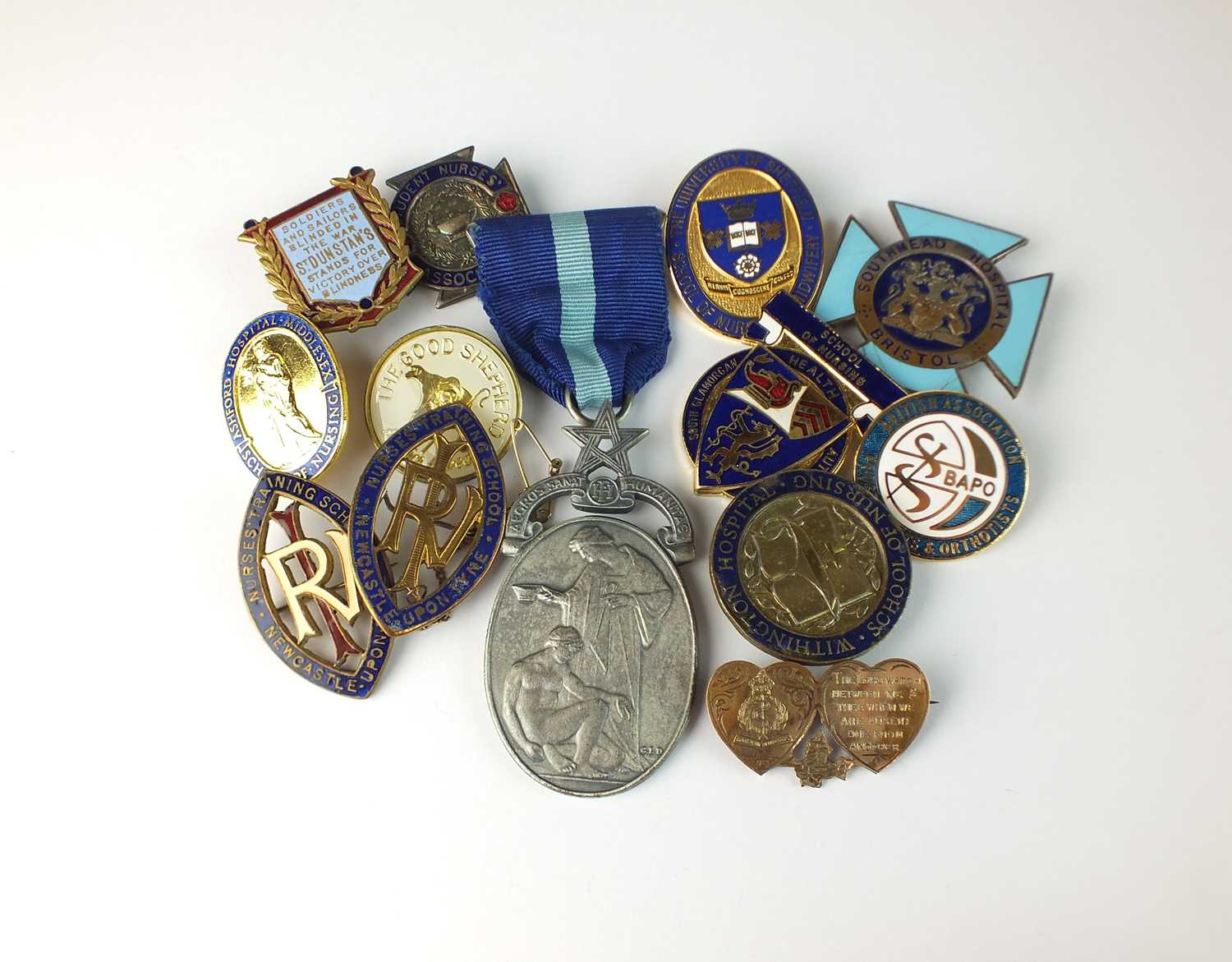 85 - A collection of nursing badges