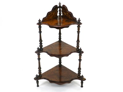 Lot 195 - An Edwardian inlaid corner whatnot, the three...