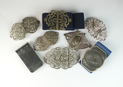 Lot 89 - A collection of eleven nurses buckles