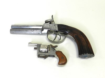 Lot 202 - A replica pistol and a replica revolver