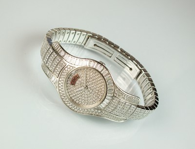 Lot 50 - Ebel, A lady's 18ct white gold and diamond set bracelet watch