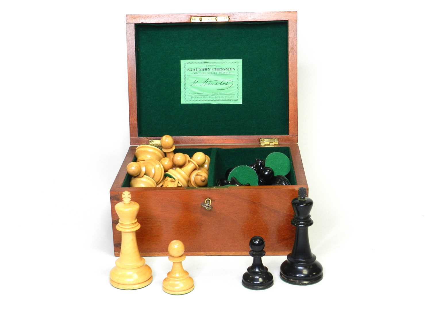 Lot 243 - An early 20th century Jaques, Staunton pattern, boxwood and ebonised weighted, boxed chess set