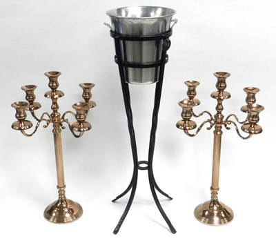 Lot 242 - A pair of contemporary four-branch candelabra and a champagne stand