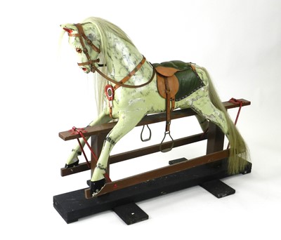 Lot 244 - A British painted wood rocking horse