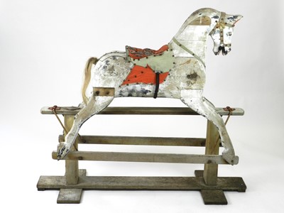 Lot 245 - A British painted wood rocking horse