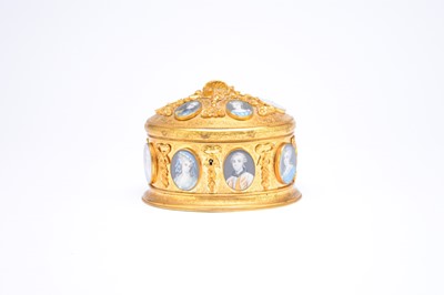 Lot 424 - A 19th century, French, gilt metal oval casket, inset with 14 miniatures