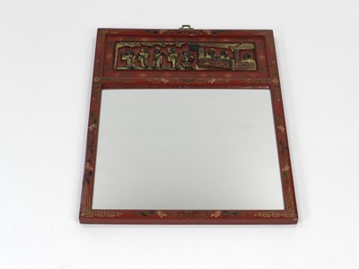 Lot 391 - Two 20th century Chinese, relief moulded and painted mirrors, largest 61cm x 46cm wide (2)