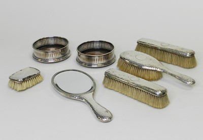 Lot 18 - A matched collection of four silver mounted dressing tablewares