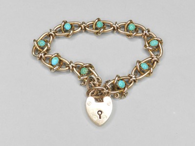 Lot 162 - A yellow metal turquoise set bracelet