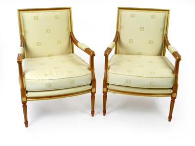 Lot 398 - A pair of recent Clive Christian beech upholstered open armchairs