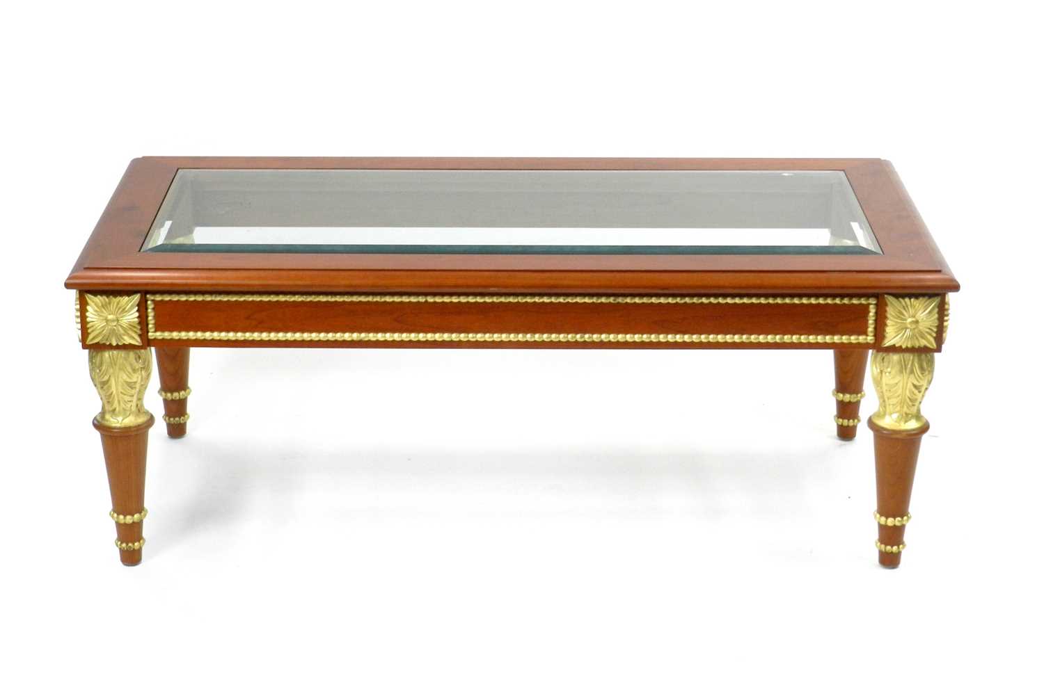 Lot 366 - A recent Clive Christian stained beech glass-topped coffee table