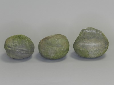 Lot 332 - Three carved stone garden orbs