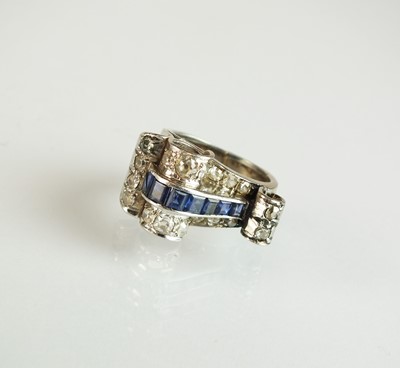 Lot 140 - An Art Deco diamond and sapphire cocktail ring