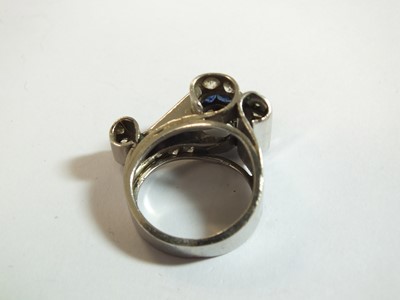 Lot 140 - An Art Deco diamond and sapphire cocktail ring