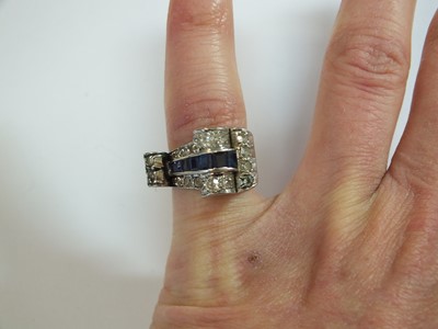 Lot 140 - An Art Deco diamond and sapphire cocktail ring