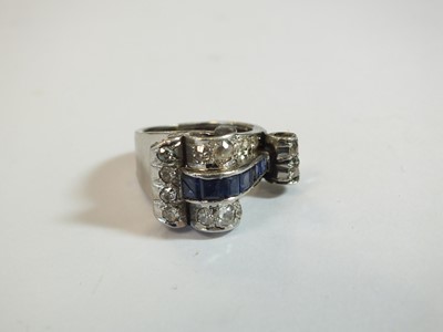 Lot 140 - An Art Deco diamond and sapphire cocktail ring