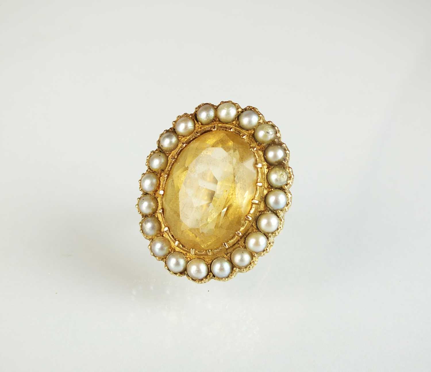 Lot 75 - A 9ct gold citrine and split pearl cluster ring