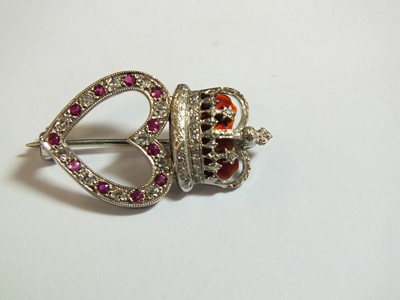 Lot 88 - A 9ct white gold diamond, ruby and enamel heart and crown brooch