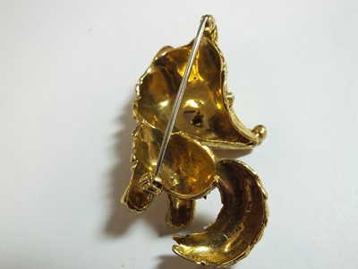Lot 99 - An 18ct gold turquoise and sapphire novelty brooch in the form of a fox