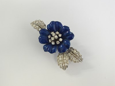 Lot 34 - A blue enamel and diamond flower brooch by Boucheron
