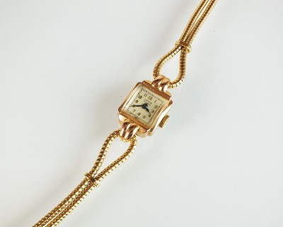 Lot 145 - A lady's 14k gold Lathin wristwatch