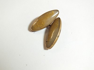 Lot 83 - A pair of quartz agate cufflinks