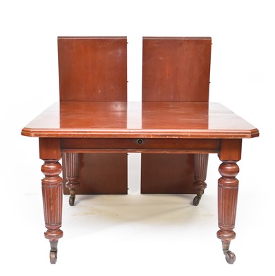 Lot 59 - A Victorian mahogany wind-out dining table with two additional leaves