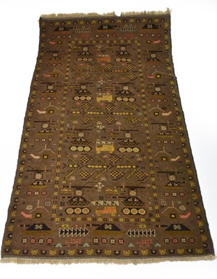 Lot 262 - An Afghan war rug