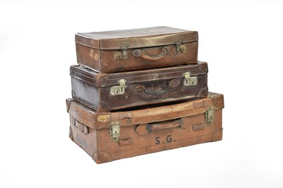 Lot 22 - Three vintage graduated leather suitcases