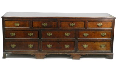 Lot 374 - An 18th century oak chest of drawers, formerly the base to a larger piece of furniture