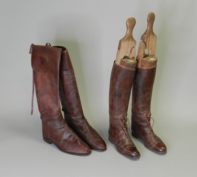 Lot 304 - Two pairs of vintage leather riding boots with a set of wood boot trees